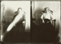 Double photo of a seated young man and a seated girl. EW Carter photo ca. 1900 Glass negative: 7″x5″