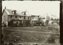 Street scene featuring the Palace Hotel and Kalispell Beer. Probably somewhere near Kalispell, Montana EW Carter photo ca. 1900 Glass negative 1: 7″x5″