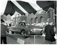 1956 OLDSMOBILE Experimental “Golden Rocket” 5″x4″ black & white negative D-12 X23388-44 A lightweight, fiberglass-bodied sports coupe for GM Motorama Oldsmobile Greets NOBLES Of The MYSTIC SHRINE Near Hotel Staler Detroit, Michigan ca. 1956 275-hp “Rocket” V-8 engine Compression Ratio 9.50 to 1 Width 75.4″ Height 49.5″ Wheelbase 105″ Length 201.1″ Front Tread 59″ Rear Tread 56″