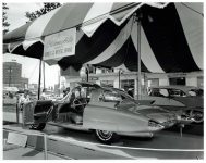 1956 OLDSMOBILE Experimental “Golden Rocket” 5″x4″ black & white negative E-3 X23388-52 A lightweight, fiberglass-bodied sports coupe for GM Motorama Oldsmobile Greets NOBLES Of The MYSTIC SHRINE Near Hotel Staler Detroit, Michigan ca. 1956 275-hp “Rocket” V-8 engine Compression Ratio 9.50 to 1 Width 75.4″ Height 49.5″ Wheelbase 105″ Length 201.1″ Front Tread 59″ Rear Tread 56″