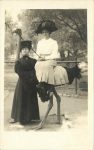 1910 ca. Ostrich Farm Pasadena, CAL Two women one seated on an ostrich RPPC front