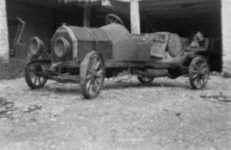 1949 ca. Pulling 1911 BERGDOLL Special Roadster from barn