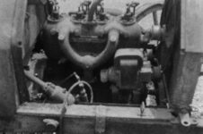 1949 ca. Pulling 1911 BERGDOLL Special Roadster from barn IN side engine