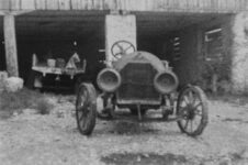 1949 ca. Pulling 1911 BERGDOLL Special Roadster from barn front view 2