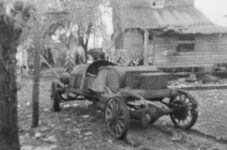 1949 ca. Pulling 1911 BERGDOLL Special Roadster from barn rear left view