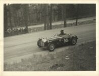 1950-1956 Pebble Beach Road Races “Racing in the Pines” Ken Miles in his M.G. Special was way ahead when mechanical difficulties occured. 8″×10″ photo front 06